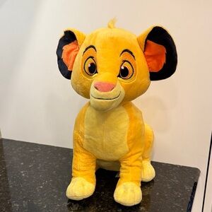 Disney Simba Plush Toy - Yellow and Black. Imports dragon. Size 13”